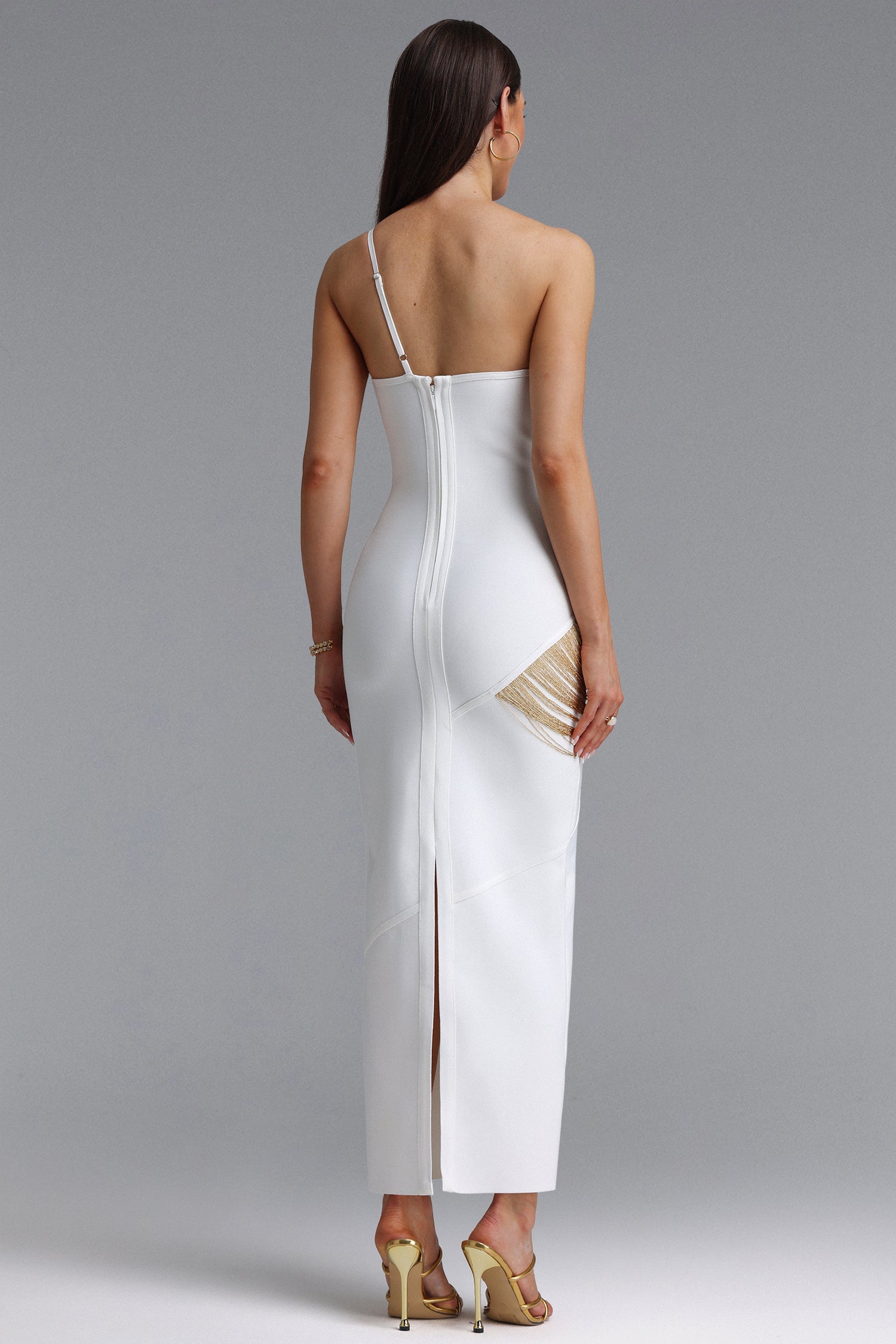 Roanna One Shoulder Sleeveless Golden Tassels Bandage White Maxi Dress	