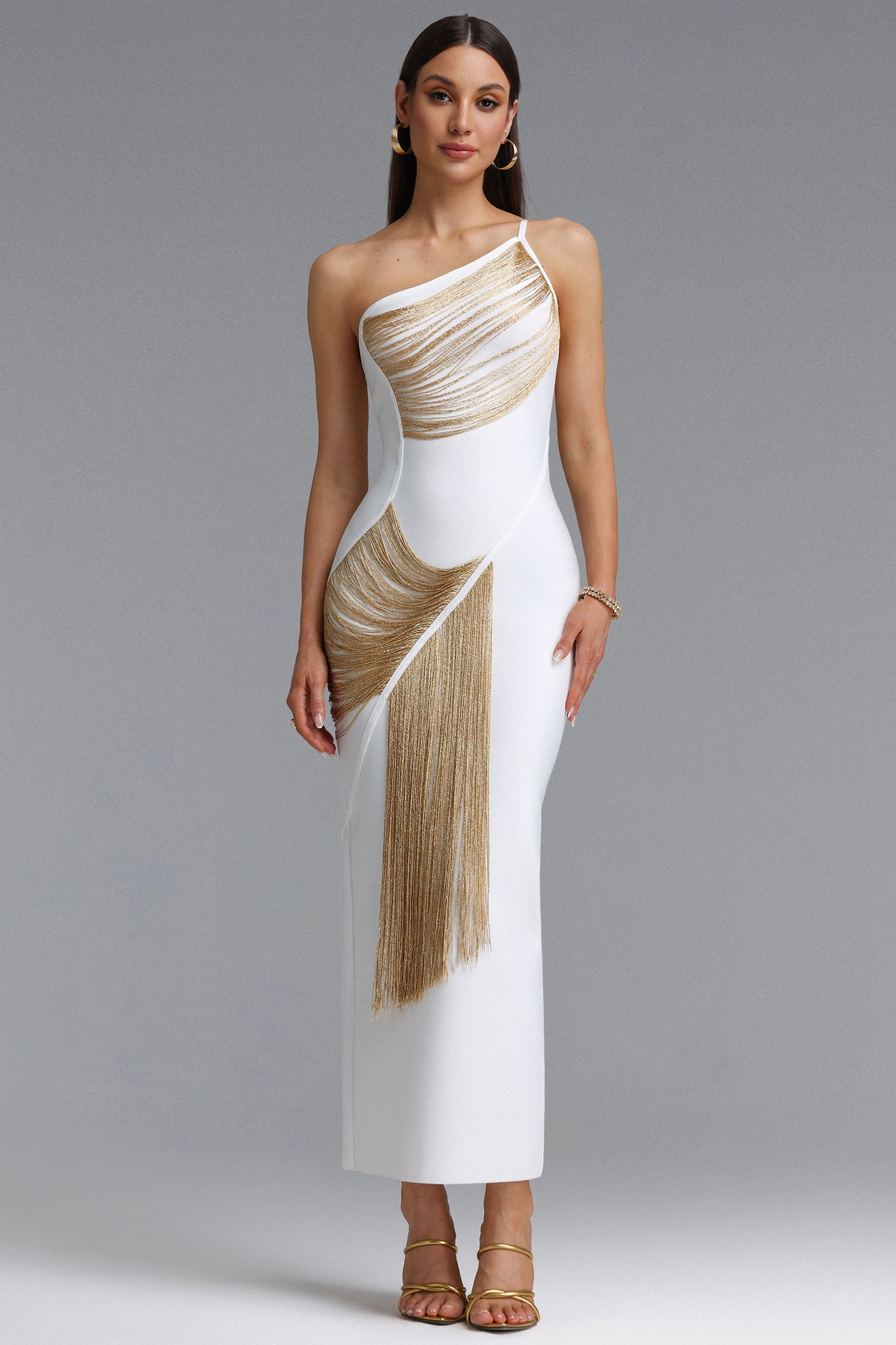 Roanna One Shoulder Sleeveless Golden Tassels Bandage White Maxi Dress	